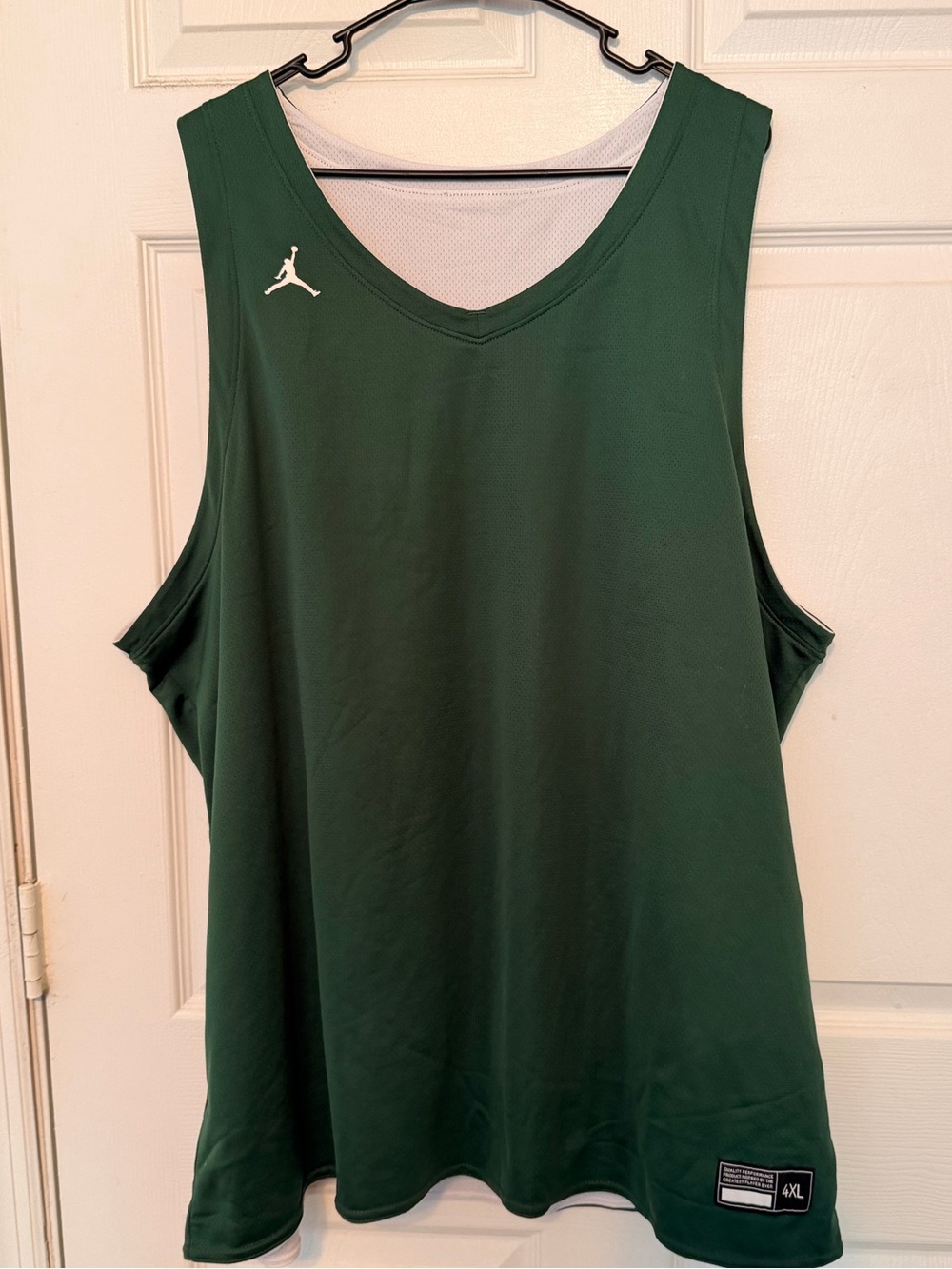 Reversible Nike Jordan Dark Green And White Basketball Tank.